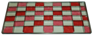 A close up of a tray with red and white squares