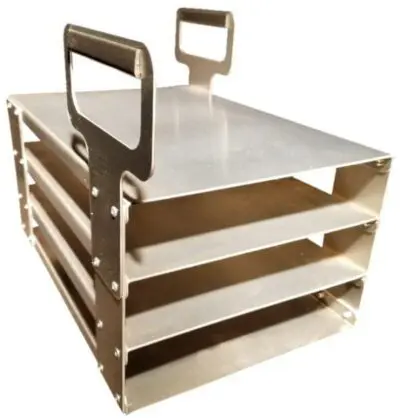 A stack of three trays with handles on top.