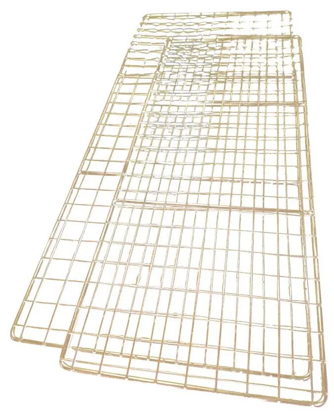 A pair of white metal cages with wire mesh.